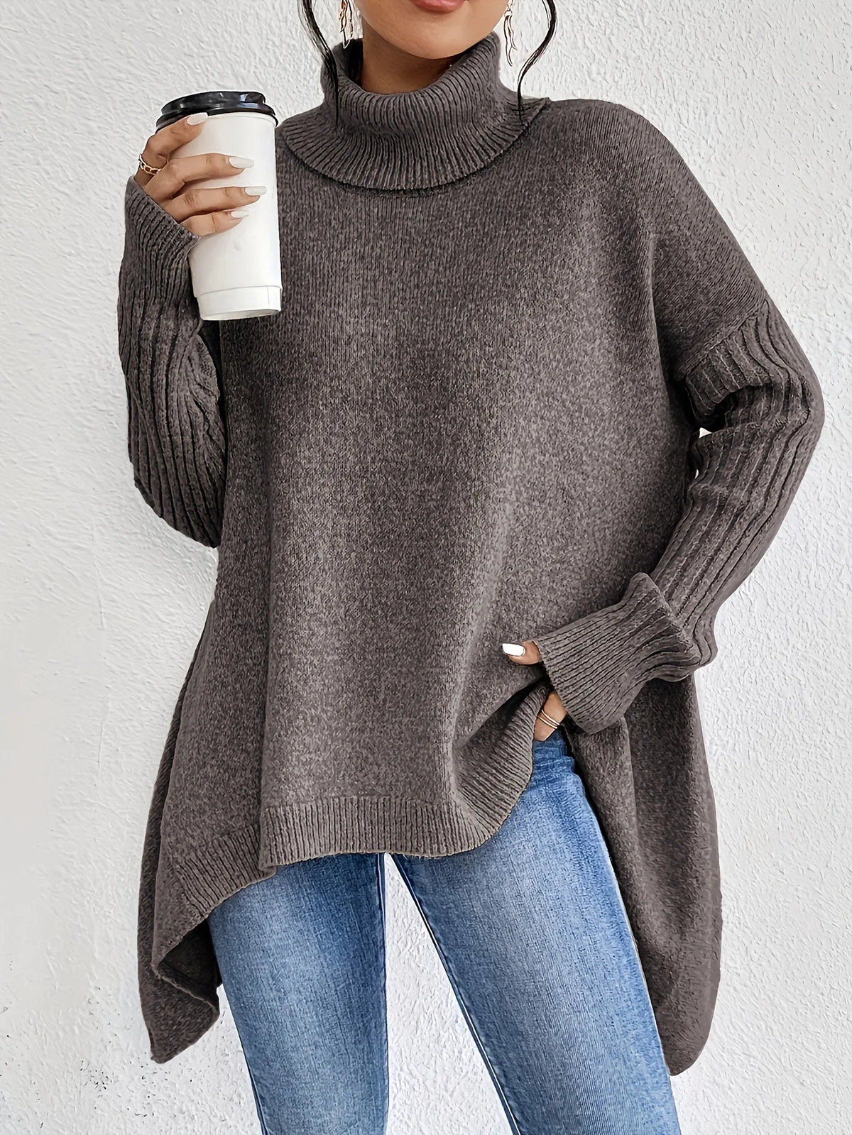 Oversized Turtleneck Sweater with Asymmetric Hem and Ribbed Sleeves