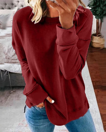 Crew Neck Sweatshirt with Curved Hem and Side Slits