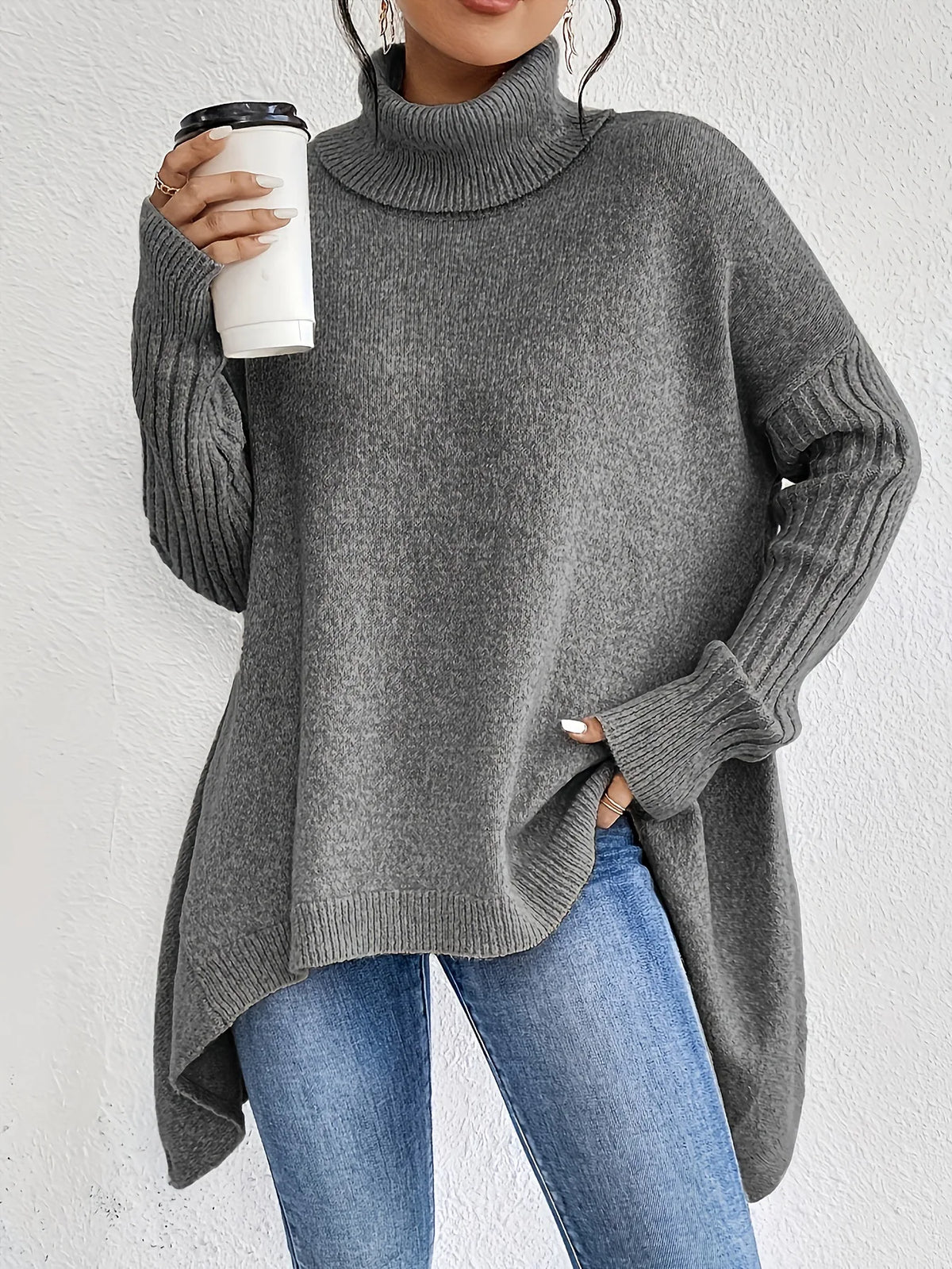 Oversized Turtleneck Sweater with Asymmetric Hem and Ribbed Sleeves