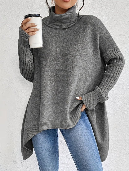 Oversized Turtleneck Sweater with Asymmetric Hem and Ribbed Sleeves