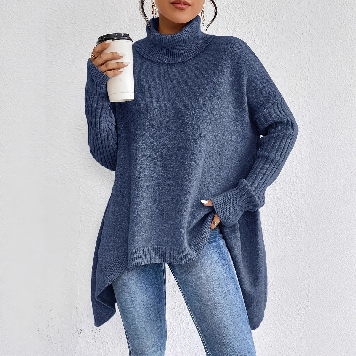 Oversized Turtleneck Sweater with Asymmetric Hem and Ribbed Sleeves